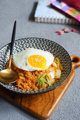 a bowl of fried rice with egg