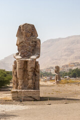 Ancient statues of Colossi on the west bank of the Nile, Luxor, Egypt