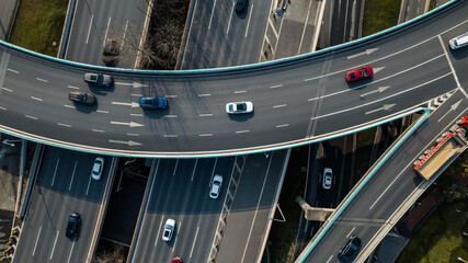 Top up aerial drone view of elevated road and traffic junctions in Chinese metropolis city Chengdu...