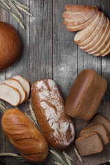 assortment of baked bread on a rustic table