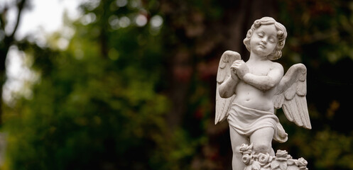 Death concept. Little beautiful angel crying as symbol of pain, fear and end of human life....