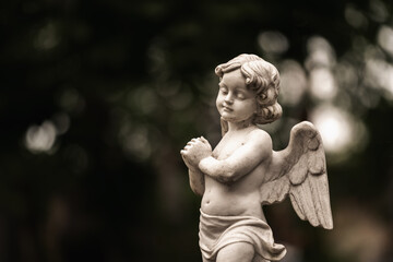 Death concept. Little beautiful angel crying as symbol of pain, fear and end of human life....