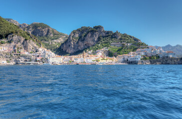 Fototapeta na wymiar Amalfi coast, Italy - July 01 2021: Spectacular view from the sea on the town of Amalfi