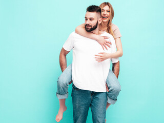 Sexy smiling beautiful woman and her handsome boyfriend. Happy cheerful family having tender...