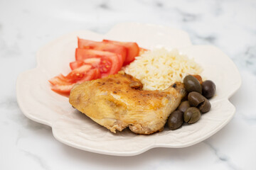 grilled chicken with boiled rice and fresh salad
