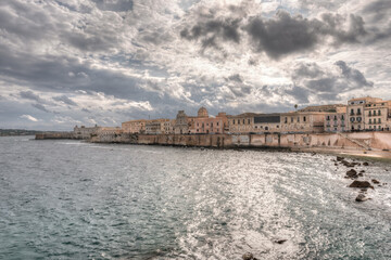 Naklejka premium The breathtaking scenery of the Ortigia seafront in Syracuse Sicily