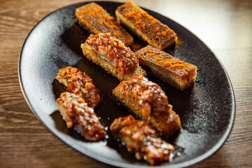 crouton appetizer with fish and dried vegetables