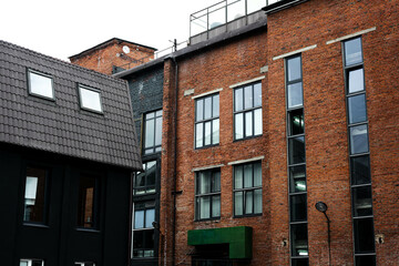Fototapeta na wymiar old loft brick houses in the city