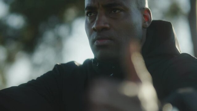 black man running and excercising sportspark sunset fitness slowmotion