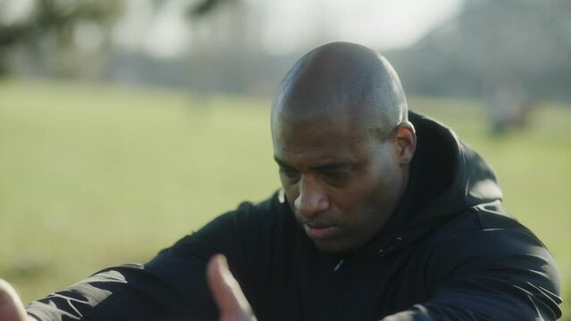 black man running and excercising sportspark sunset fitness slowmotion