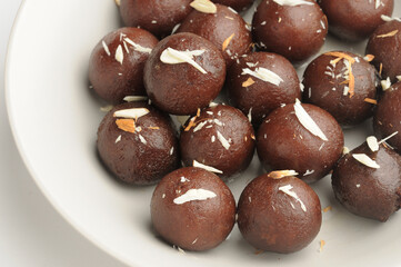 Kala Jamun with almond toppings, Indian dessert 