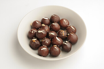 Kala Jamun with almond toppings, Indian dessert 