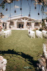 wedding ceremony on the lawn near the ranch