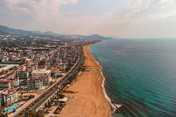 Drone photo of Alanya coast with Mediterranean turquoise sea and mountains, Turkey