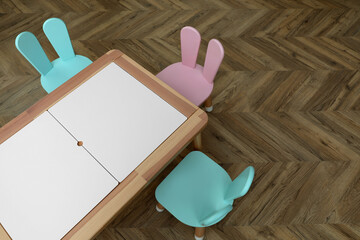 Fototapeta na wymiar Small table and chairs with bunny ears in children's room