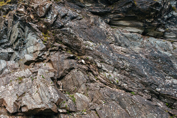Close-up portrait mountain rocks formation. Background, texture. Natural background. Grunge texture.