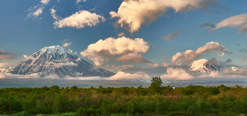 Kamchatka, Russia. Tourist land of volcanoes and wildlife. Travel, mountaineering and extreme....