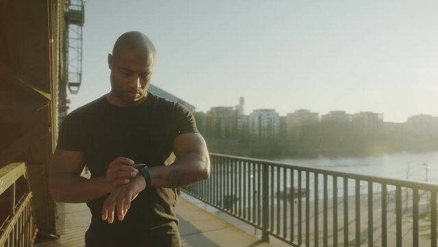 black man running smart watch