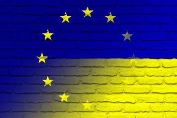 European Union (EU) and Ukraine. European Union flag and Ukraine flag. Concept of aid, association of countries, political and economic relations. Flag with brick wall texture. OTAN-NATO flag.