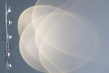 Abstract element light from sunset projection lamp decoration for interior cafe design. Modern ornamental in cafe or coffee shop desing on the wall.