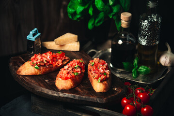 Traditional Italian bruschetta served on a wooden board