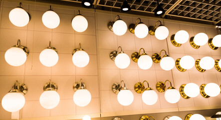 Many wall lamps in the furniture shop