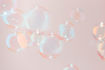 Beautiful Pink Shiny Transparent Soap Bubbles Texture Background. Soap Sud Bubbles Water