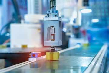 Industrial robot with vacuum suckers with conveyor in manufacture factory,Smart factory industry 4.0 concept.