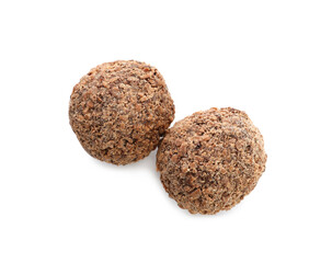 Delicious chocolate truffles on white background, top view