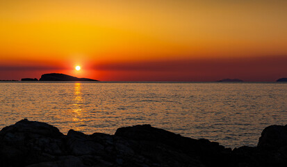 Orange sunset over s sea