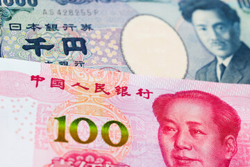 Japanese Yen and Chinese yuan bank note