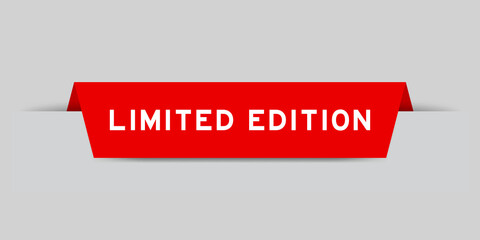 Red color inserted label with word limited edition on gray background