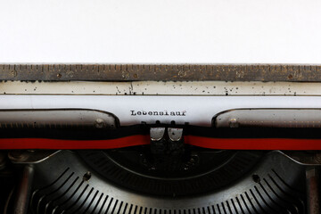 The German word Lebenslaufwritten on an old mechanical typewriter German Text: Curriculum vitae