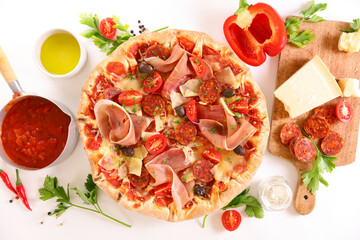 homemade pizza with ham,  chorizo,  tomato and cheese