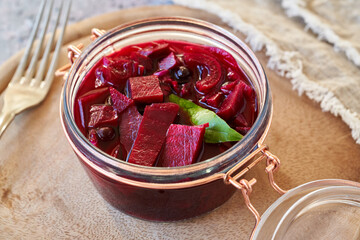 Fermented beet kvass with spices in a glass jar - obrazy, fototapety, plakaty