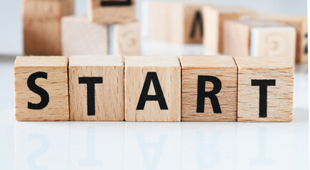 START word composed of wooden blocks.