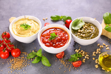 assorted of sauce ( tomato sauce,  pesto and mayonnaise)