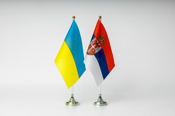 State flags of Ukraine and Serbia on a light background. State flags.