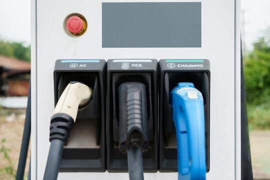 Photograph of the modern electric vehicle charging station or EV quick charging station for battery electric vehicleใ