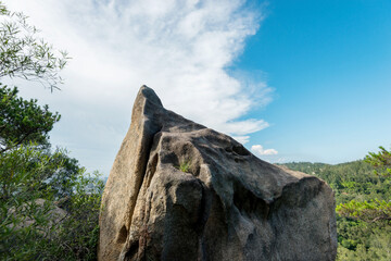 Big rock in the mountains and blue sky