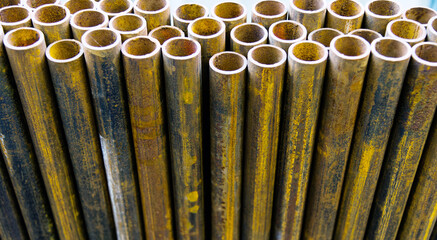 Stack of round metal tubes