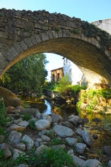 Medieval bridge over the Ambroz river in Hervás, province of Cáceres, Extremadura, Spain