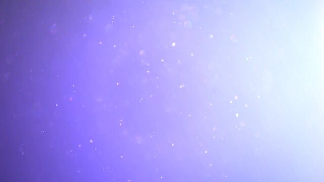 Flickering Dust Particles on Blue Background