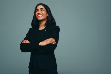 American congresswoman smiling cheerfully in a studio