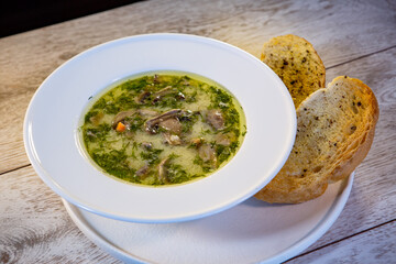 mushroom soup with two croutons