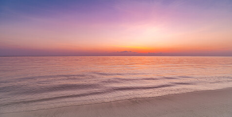Closeup sea sand beach. Panoramic beach landscape. Inspire tropical beach seascape horizon. Purple...