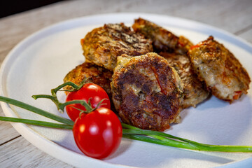 cutlets with tomatoes and bell pepper