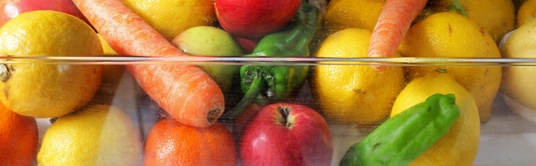 fruit and vegetables in a refrigerator
