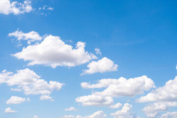 group of beautiful sky white clouds perfect for the background, clear blue sky, sunlight , winter