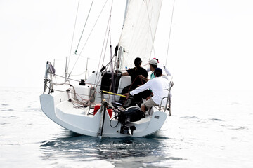 Crew in a boat during sailing yachts regatta © kirill_makarov